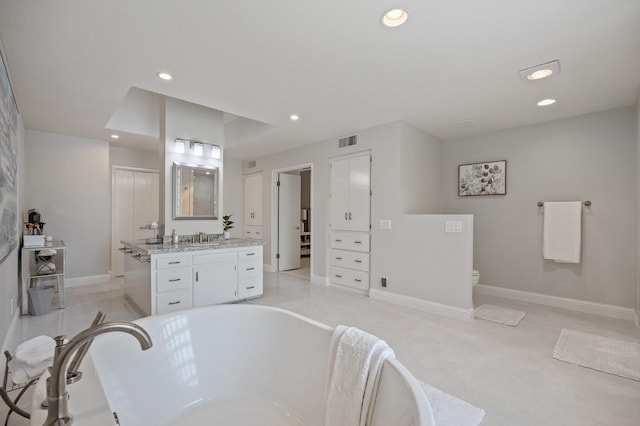 2734 W Bluff Ave, Fresno, CA 93711 - bathroom featuring vanity, a bath, and recessed lighting