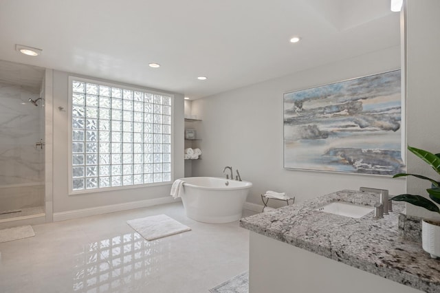 2734 W Bluff Ave, Fresno, CA 93711 - bathroom with a stall shower, a freestanding tub, recessed lighting, vanity, and plenty of natural light