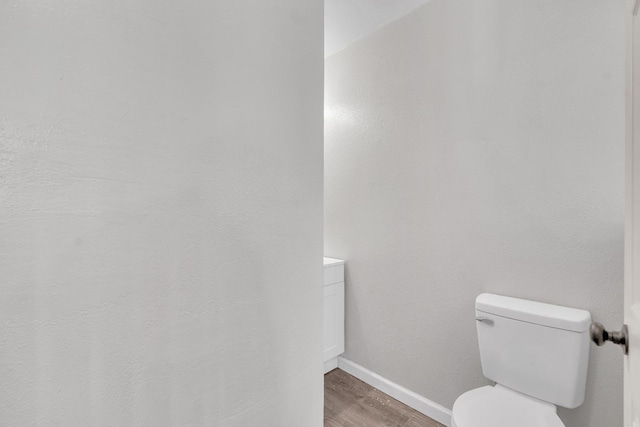 3137 E Townsend Ave, Fresno, CA 93702 - bathroom with toilet and wood finished floors