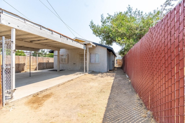 3137 E Townsend Ave, Fresno, CA 93702 - view of side of home featuring stucco siding