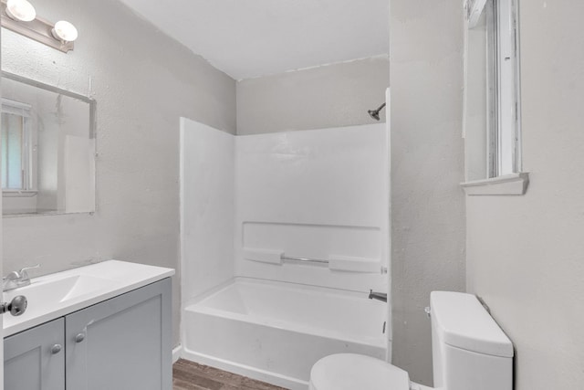 3137 E Townsend Ave, Fresno, CA 93702 - full bathroom featuring vanity, wood finished floors, and shower / bathtub combination