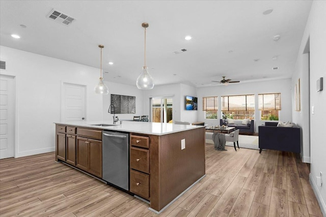 2062 N Osmun Ave, Clovis, CA 93619 - kitchen featuring stainless steel dishwasher, a ceiling fan, light wood-style floors, recessed lighting, and light countertops