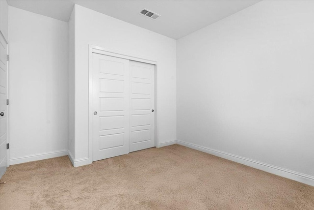 2062 N Osmun Ave, Clovis, CA 93619 - unfurnished bedroom with carpet floors and a closet