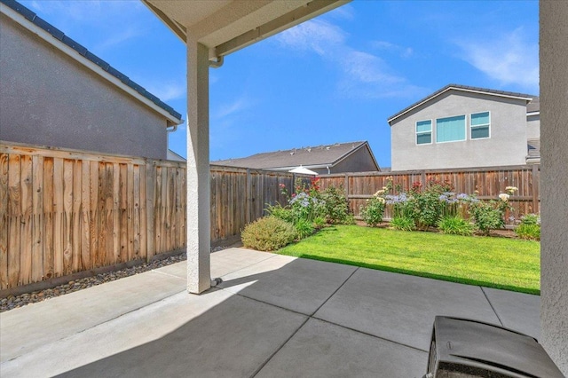 2062 N Osmun Ave, Clovis, CA 93619 - fenced backyard featuring a patio area