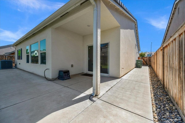 2062 N Osmun Ave, Clovis, CA 93619 - rear view of house featuring stucco siding, a patio area, and a fenced backyard