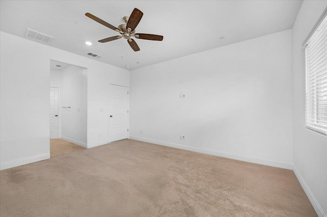 2062 N Osmun Ave, Clovis, CA 93619 - unfurnished bedroom with light carpet, recessed lighting, and a ceiling fan