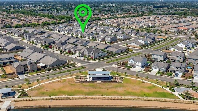 2062 N Osmun Ave, Clovis, CA 93619 - aerial overview of property's location featuring nearby suburban area and a large body of water
