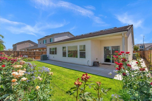 2062 N Osmun Ave, Clovis, CA 93619 - back of property featuring stucco siding, a patio area, and a fenced backyard