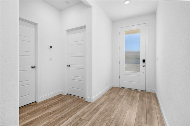 2062 N Osmun Ave, Clovis, CA 93619 - doorway to outside with light wood finished floors and baseboards