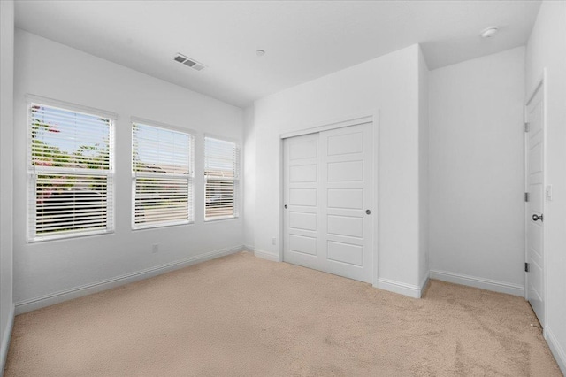 2062 N Osmun Ave, Clovis, CA 93619 - unfurnished bedroom featuring carpet and a closet