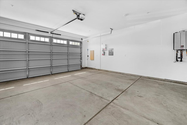 2062 N Osmun Ave, Clovis, CA 93619 - garage featuring electric panel, a garage door opener, and tankless water heater