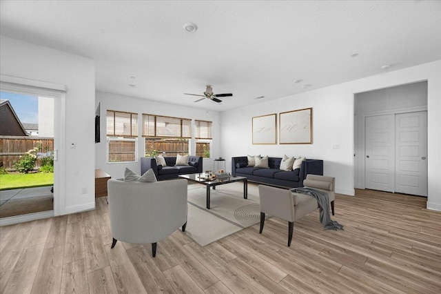 2062 N Osmun Ave, Clovis, CA 93619 - living area featuring light wood finished floors and ceiling fan