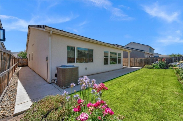 2062 N Osmun Ave, Clovis, CA 93619 - back of property with a patio, a fenced backyard, and stucco siding