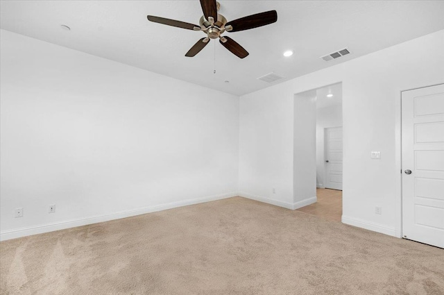 2062 N Osmun Ave, Clovis, CA 93619 - unfurnished room with light colored carpet, ceiling fan, and recessed lighting