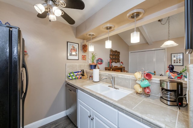 5090 N College Ave Unit 103, Fresno, CA 93704 - kitchen with freestanding refrigerator, dishwasher, a ceiling fan, tile counters, and decorative light fixtures
