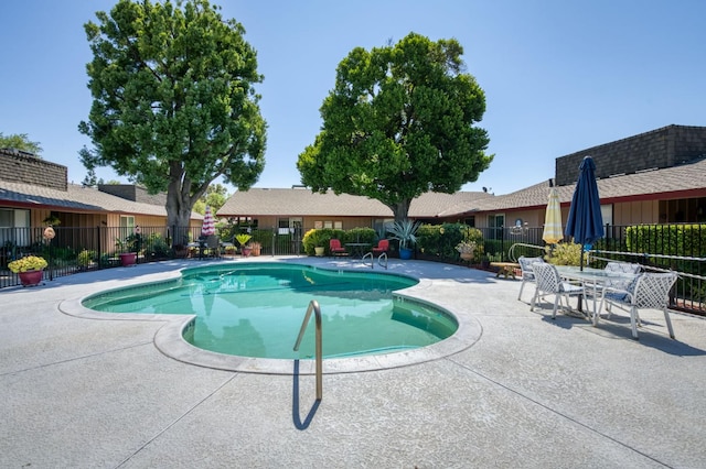 5090 N College Ave Unit 103, Fresno, CA 93704 - community pool featuring a patio area
