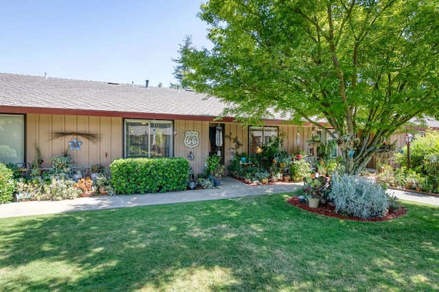 5090 N College Ave Unit 103, Fresno, CA 93704 - single story home featuring board and batten siding, a front lawn, and roof with shingles