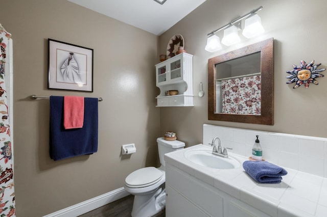 5090 N College Ave Unit 103, Fresno, CA 93704 - bathroom featuring vanity and wood finished floors