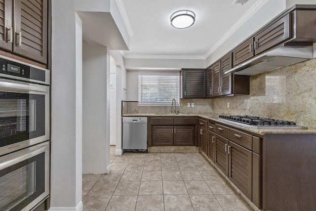 3012 W Santa Ana Ave, Fresno, CA 93722 - kitchen featuring appliances with stainless steel finishes, ornamental molding, dark brown cabinetry, backsplash, and light tile patterned flooring