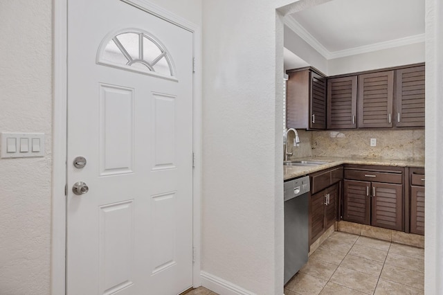 3012 W Santa Ana Ave, Fresno, CA 93722 - kitchen featuring stainless steel dishwasher, crown molding, dark brown cabinetry, backsplash, and a textured wall