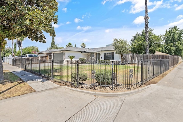 3012 W Santa Ana Ave, Fresno, CA 93722 - ranch-style home featuring stucco siding, a garage, and a fenced front yard