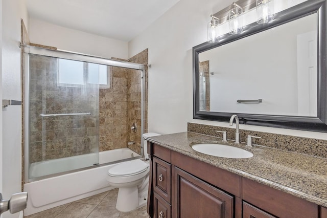 3012 W Santa Ana Ave, Fresno, CA 93722 - full bath featuring vanity, bath / shower combo with glass door, and tile patterned floors