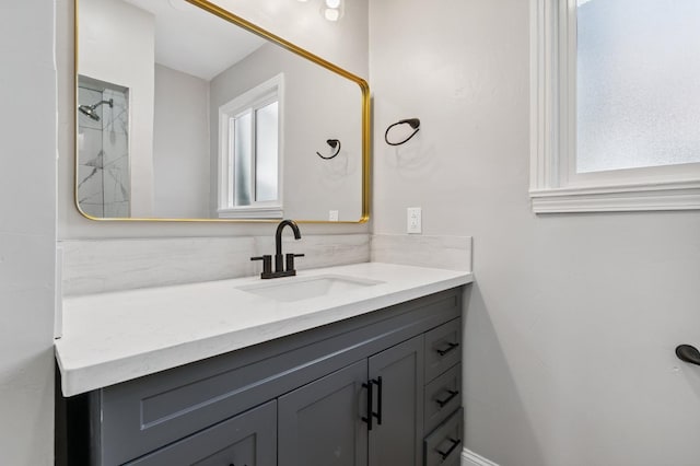 4545 E Grant Ave, Fresno, CA 93702 - full bathroom featuring vanity, plenty of natural light, and a shower