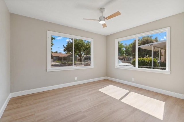 4545 E Grant Ave, Fresno, CA 93702 - spare room with light wood-style flooring and ceiling fan