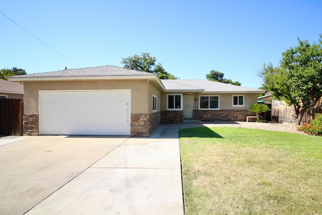 3377 E Richert Ave, Fresno, CA 93726 - ranch-style home with stone siding, an attached garage, concrete driveway, and stucco siding