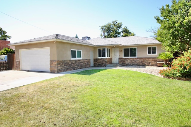 3377 E Richert Ave, Fresno, CA 93726 - single story home featuring an attached garage, stucco siding, concrete driveway, a front lawn, and stone siding