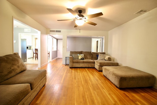 3377 E Richert Ave, Fresno, CA 93726 - living area featuring ceiling fan and light wood-style flooring