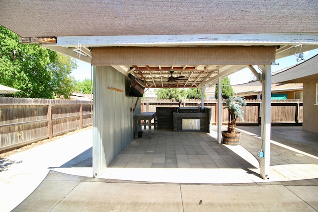 3377 E Richert Ave, Fresno, CA 93726 - view of car parking featuring a ceiling fan and a fenced backyard