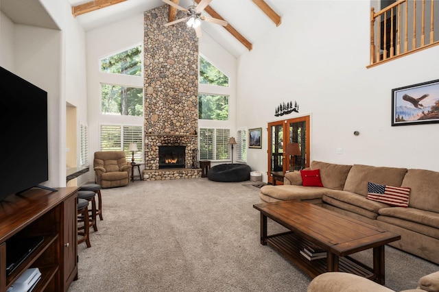 40416 Wild Rose Ln, Shaver Lake, CA 93664 - living area with high vaulted ceiling, carpet floors, plenty of natural light, beamed ceiling, and ceiling fan