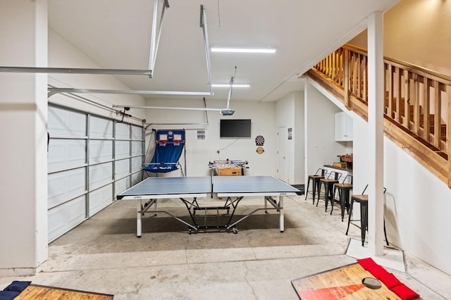 40416 Wild Rose Ln, Shaver Lake, CA 93664 - game room with unfinished concrete floors and a garage