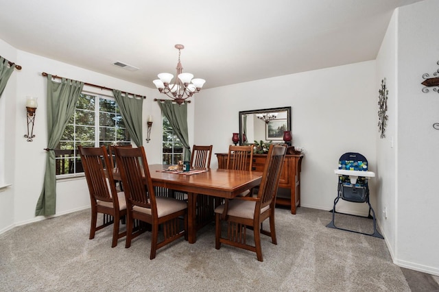 40416 Wild Rose Ln, Shaver Lake, CA 93664 - dining area featuring a chandelier and light carpet
