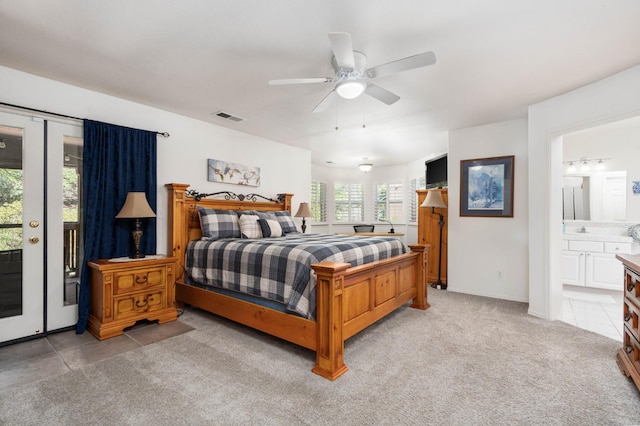 40416 Wild Rose Ln, Shaver Lake, CA 93664 - bedroom featuring access to outside, light carpet, light tile patterned floors, ensuite bathroom, and a ceiling fan
