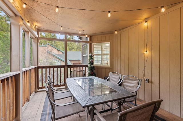 40416 Wild Rose Ln, Shaver Lake, CA 93664 - sunroom featuring outdoor dining space and rail lighting