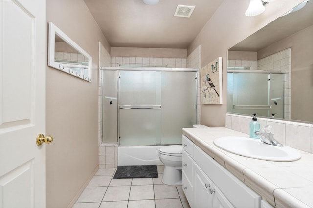 40416 Wild Rose Ln, Shaver Lake, CA 93664 - bathroom with vanity, tile patterned floors, and enclosed tub / shower combo