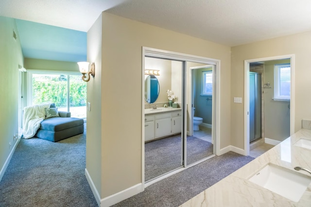 2805 W Spruce Ave, Fresno, CA 93711 - bathroom with vanity, ensuite bath, and a stall shower