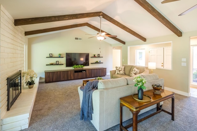 2805 W Spruce Ave, Fresno, CA 93711 - living room featuring ceiling fan, a brick fireplace, and carpet floors