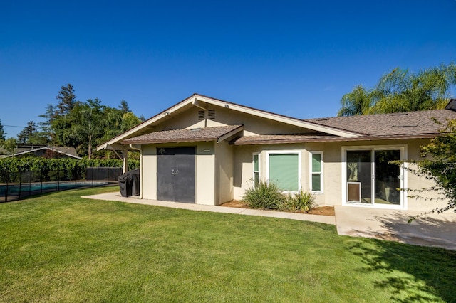 2805 W Spruce Ave, Fresno, CA 93711 - rear view of house with stucco siding and a pool