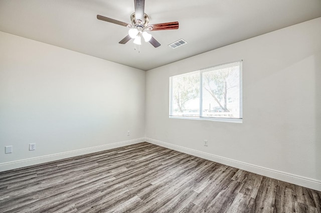 19930 Olympia Rd, Madera, CA 93638 - unfurnished room featuring wood finished floors and a ceiling fan