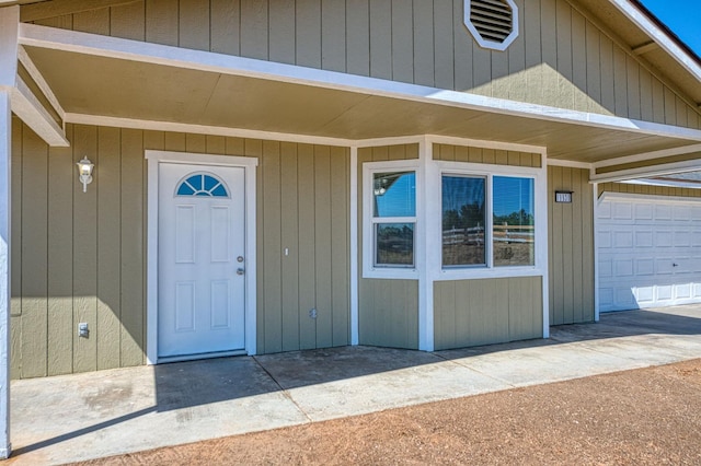 19930 Olympia Rd, Madera, CA 93638 - doorway to property featuring a garage