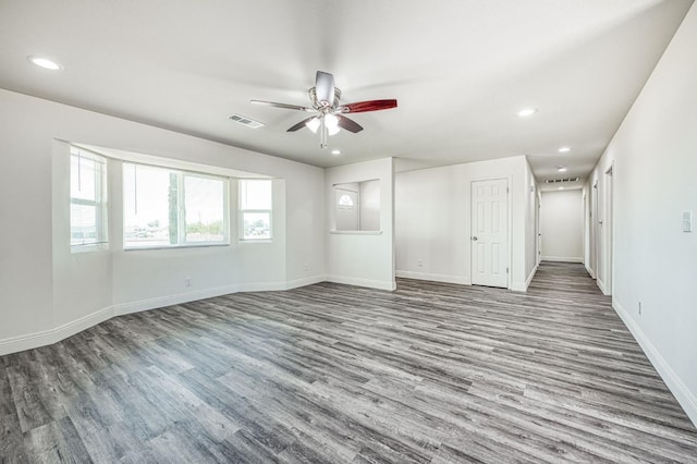 19930 Olympia Rd, Madera, CA 93638 - empty room with wood finished floors, ceiling fan, and recessed lighting