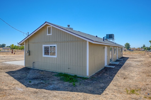 19930 Olympia Rd, Madera, CA 93638 - view of side of property featuring a central air condition unit