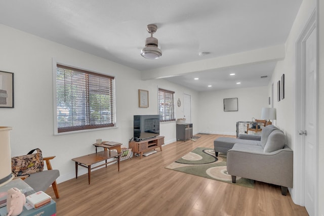 1383 N Safford Ave, Fresno, CA 93728 - living area with light wood finished floors, recessed lighting, and beamed ceiling