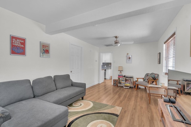 1383 N Safford Ave, Fresno, CA 93728 - living area featuring light wood-type flooring, a ceiling fan, and beam ceiling