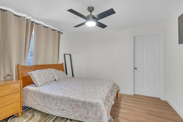 1383 N Safford Ave, Fresno, CA 93728 - bedroom with light wood-type flooring and ceiling fan