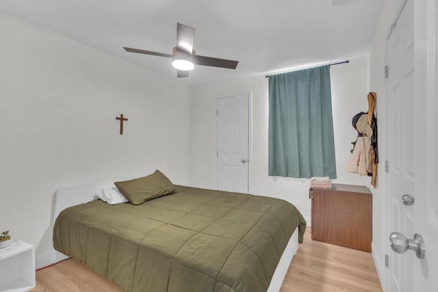 1383 N Safford Ave, Fresno, CA 93728 - bedroom with wood finished floors and a ceiling fan