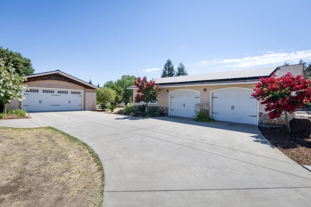 10311 E San Jose Ave, Clovis, CA 93619 - single story home with solar panels and stone siding